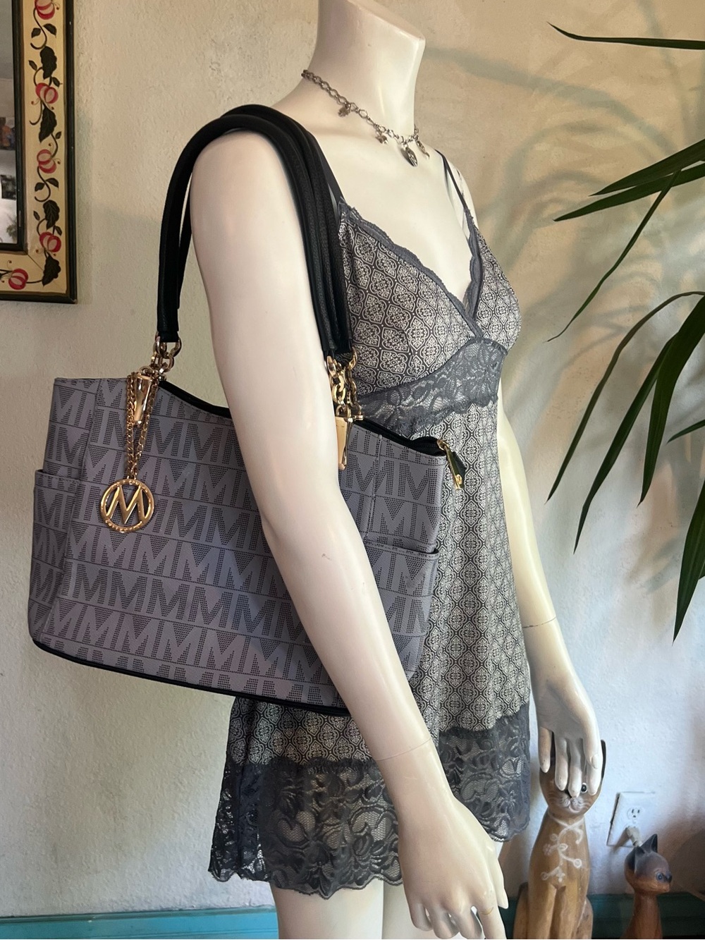 Gray Logo Pattern Tote with Black Handles and Gold Charm